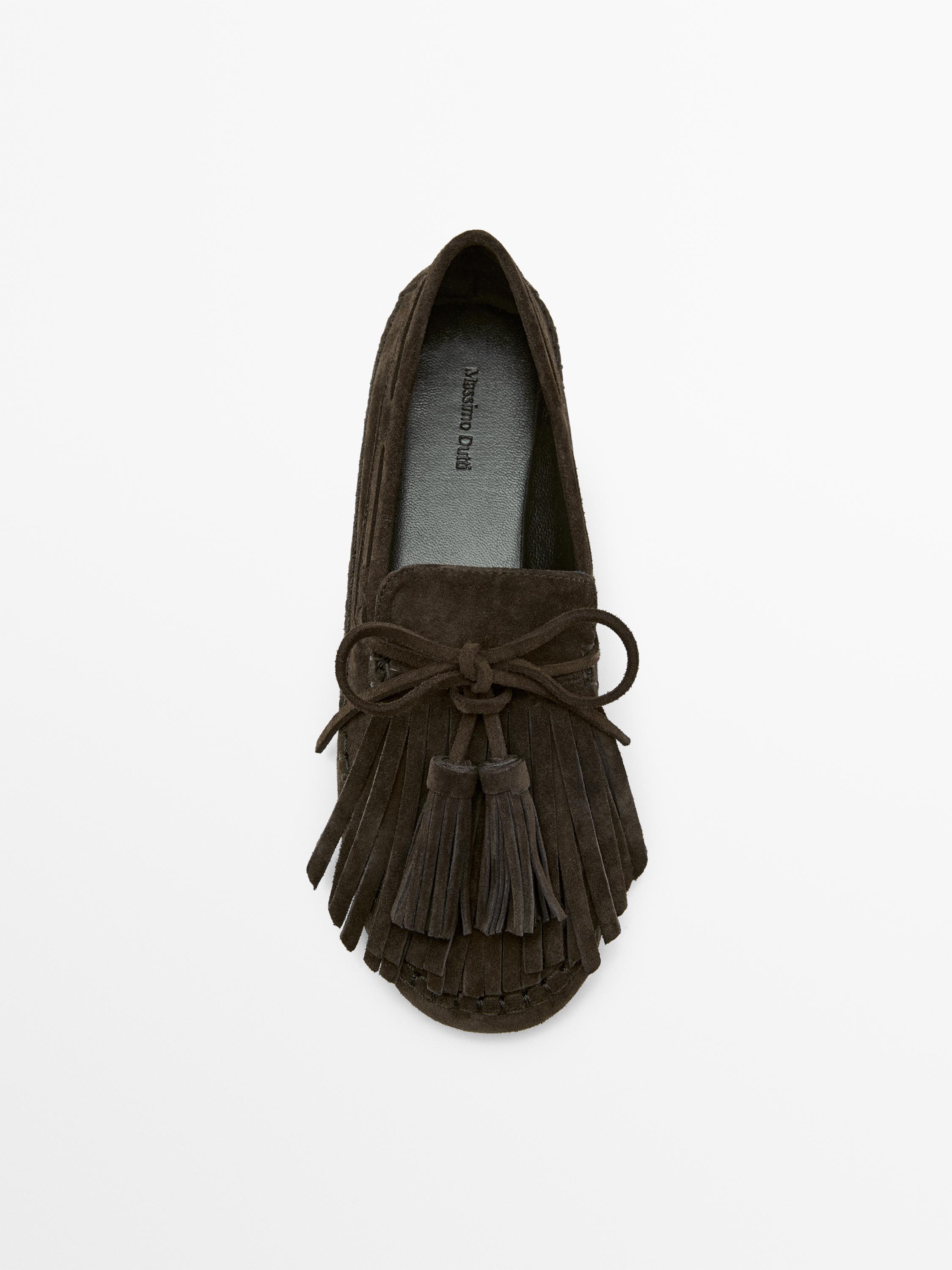 Split suede loafers with fringing and tassels